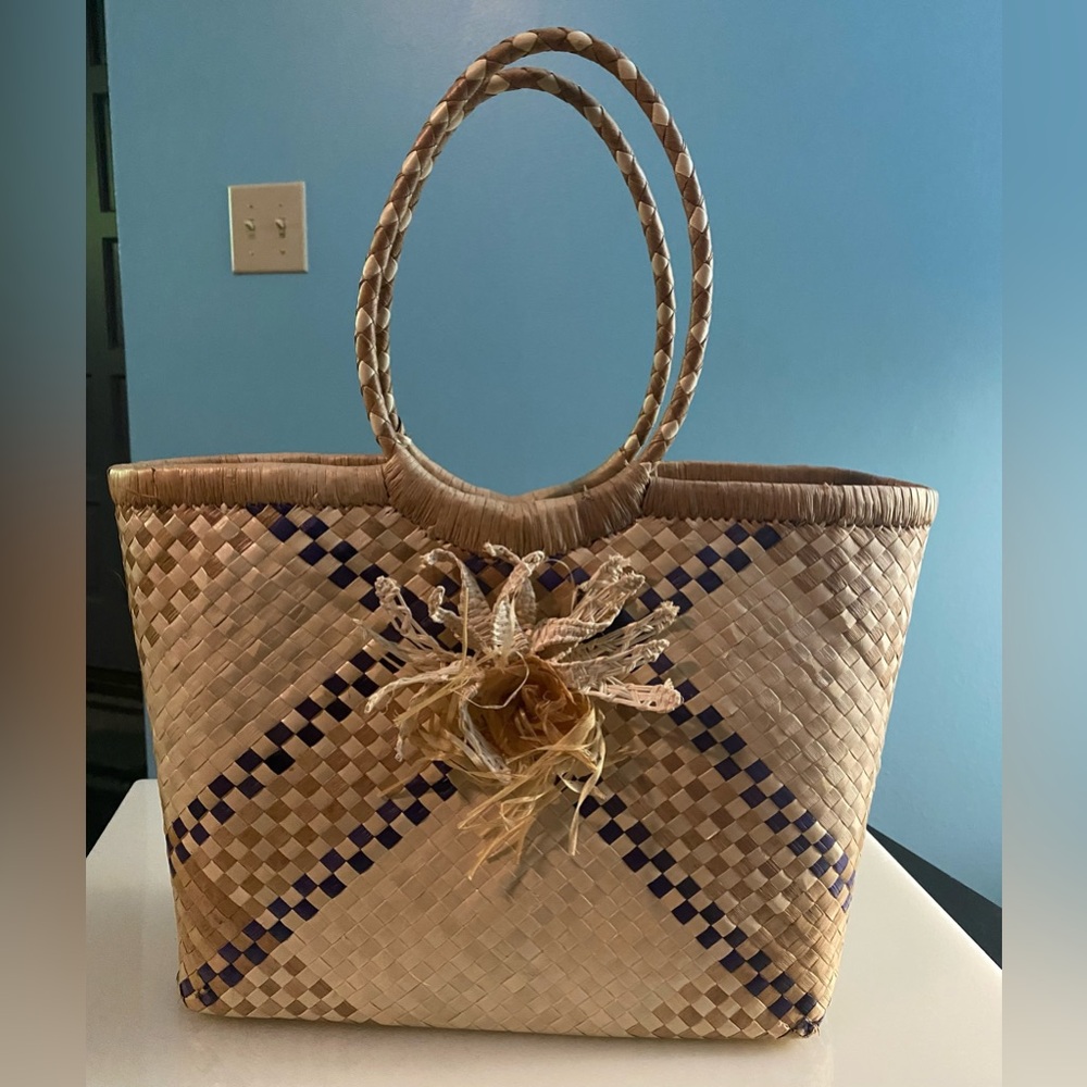 Hand made wicker tote bag. Used only once. Still in great condition.